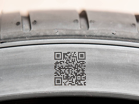 Producing permanent QR codes and barcodes with a laser