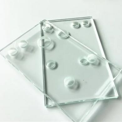 Glass laser drilling